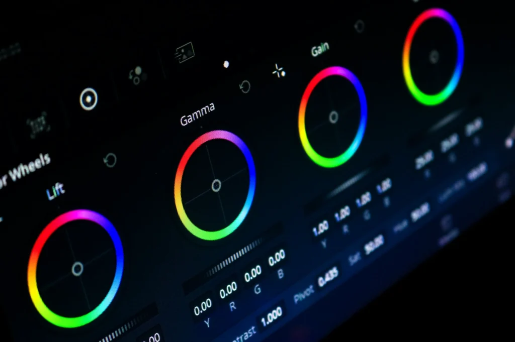 “Close-up of a digital color grading interface showing four vibrant color wheels labeled Lift, Gamma, and Gain, with precision controls below.”